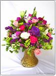 Statice and Carnations are delivered in a wicker vase. Approximately 40cm H. Contents may vary depending on availability. 
