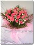 They will be charmed by this gift of 24 luxurious pink rose bouquet, surrounded by assorted greenery