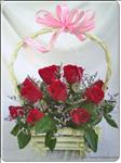 Loving someone? Show them how much with this lovely arrangement of red blooms.

