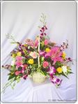 This gorgeous basket includes Stargazer lilies, orchids, daisies, carnations with assorted greenery and many more.  Great gift for celebrating someone"s birthday.