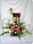 This striking bouquet includes pink roses, white orchids, and ferns that artfully arranged. This bouquet is fragrant as well as beautiful! Approximately 40cm H. 