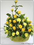 This lovely arrangement contains 3 dozen yellow roses mixed with other greenery in a lovely basket.
