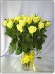 Send your love with 24 beautiful long stemmed yellow roses.  This arrangement is delivered with in clear glass vase.