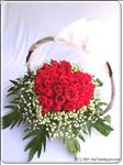 Show her your true feelings with this elegant arrangement.  This includes 30 red roses, baby breath and greens.