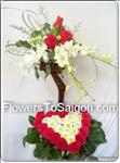 Show her your true feelings with this elegant arrangement. This includes 20 red roses, some white orchids,somes daisies, and greens.